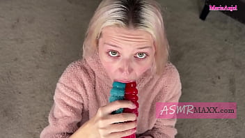 Girl Sucking gient gummy worm Candy